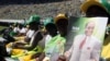 FILE: Supporters of Zimbabwean president and Zanu PF leader President Robert Mugabe are seen at his last campaign rally in Harare, July, 28, 2013.