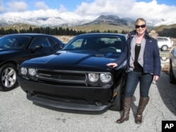Rose Mayer of Autobytel and her beloved Dodge Challenger "Rose Rage." (Photo: Business Wire)