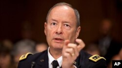 National Security Agency Director Gen. Keith Alexander testifies on Capitol Hill in Washington, Wednesday, Oct. 2, 2013.