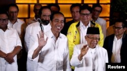 Presiden Joko Widodo bersama KH. Ma'ruf Amin bersama koalisi pendukungnya di Jakarta (17/4). 