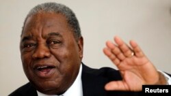 Zambia's former President Rupiah Banda gestures during the Reuters Africa Investment Summit held in Johannesburg, South, Africa, March 8, 2011. 