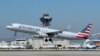 FILE PHOTO: An American Airlines Airbus A321 plane takes off from Los Angeles International airport