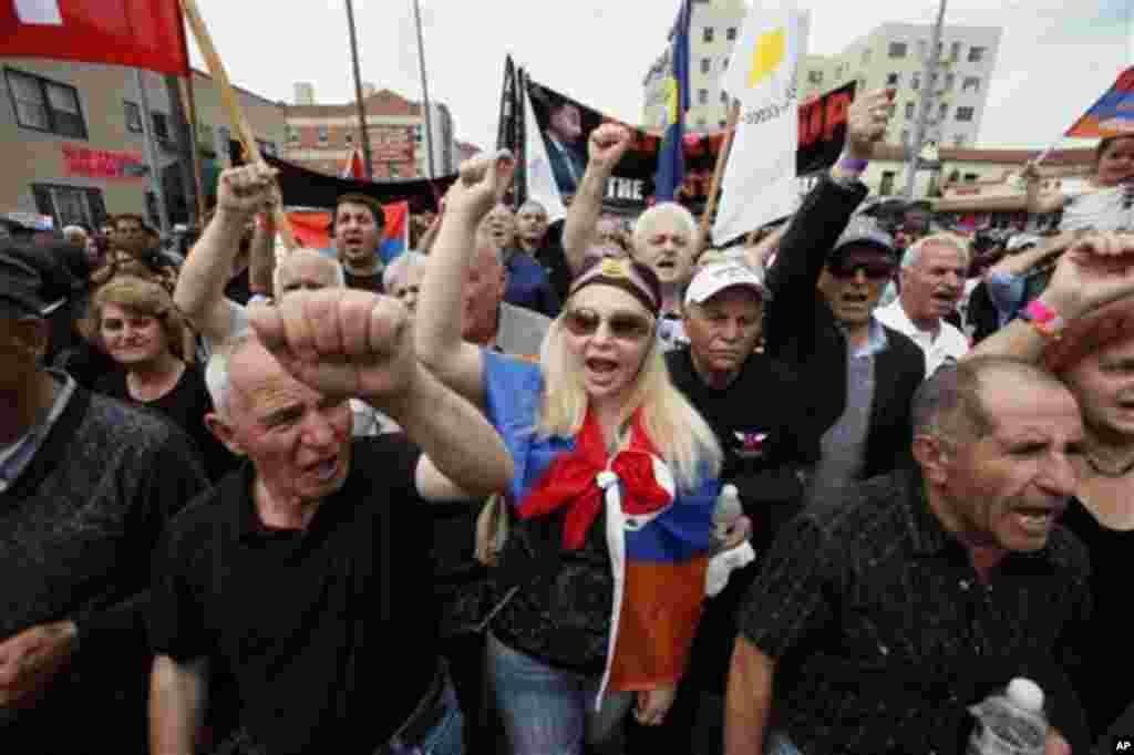 Thousands of demonstrators march Tuesday April 24, 2012 to mark the death of 1.5 million Armenians in the former Ottoman empire, in Los Angeles. The demonstration is an annual remembrance of the killings of Armenians in the Turkish territories during Worl