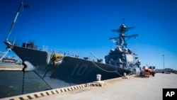 The Arleigh Burke-class destroyer USS Gravely is docked at its home port Norfolk Naval Station in Norfolk, Va. on Tuesday, March 14, 2023. U.S. officials said the ship shot down an anti-ship cruise missile fired from Yemen by the Iran-backed Houthis.