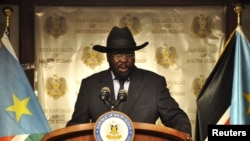 FILE - South Sudan's President Salva Kiir addresses a news conference at the Presidential palace in Juba. Ban's visit comes as opposing groups in the South Sudan peace process prepare to form a unity government.