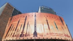 FILE - An anti-Israel billboard with a picture of Iranian missiles is seen on a street in Tehran, Iran April 19, 2024. (Majid Asgaripour/WANA, West Asia News Agency, via REUTERS)