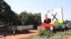 Presidential election campaign posters are seen on a billboard in Bissau, November 8, 2019. (Photo by - / AFP)