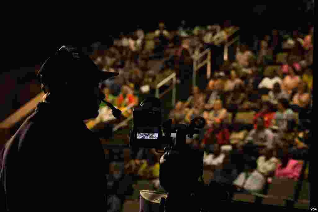 Cameraman man taking in the scene. 