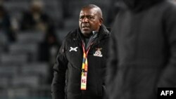 FILE - Zambia's coach Bruce Mwape looks on during the Australia and New Zealand 2023 Women's World Cup Group C football match between Spain and Zambia at Eden Park in Auckland, July 26, 2023. 