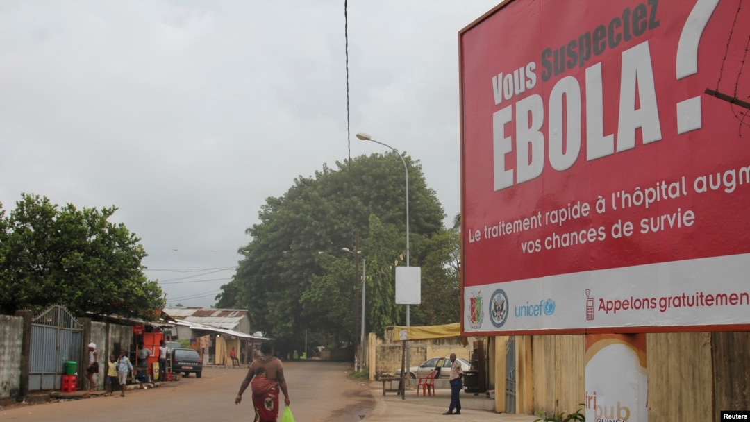 A billboard with a message about Ebola is seen on a street in Conakry, Guinea Oct. 26, 2014.