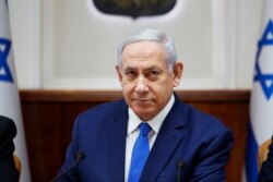 FILE - Israel's Prime Minister Benjamin Netanyahu attends the weekly cabinet meeting in Jerusalem, July 14, 2019.
