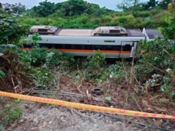 A section of a derailed train is seen cordoned off near the Taroko Gorge area in Hualien, Taiwan, April 2, 2021.