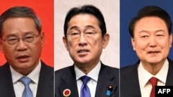 Da esquerda para a direita: Primeiro ministro da China Li Qiang, Primeir-Ministro do Japão Fumio Kishida e presidente da Coreia do SulYoon Suk Yeol