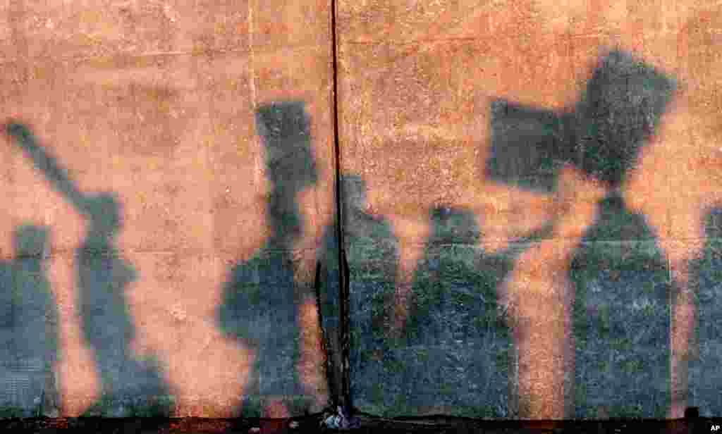 Dec. 12: Protesters march in front of an entrance to the Port of Longview in Washington. (AP/Don Ryan)