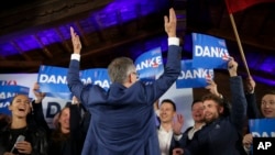 Herbert Kickl, leader of the Freedom Party of Austria cheers with supporters, in Vienna, Sept. 29, 2024, after polls closed in the country's national election. 