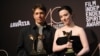 Sean Baker, left, stands with Mikey Madison at the Film Independent Spirit Awards 40th annual ceremony in Santa Monica, California, Feb. 22, 2025. Baker won best feature and best director for "Anora." Mikey Madison, who stars in the film, won best lead performer.