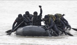 Taiwan Marines perform covert landing drills a few kilometers from mainland China near the island of Kinmen, Taiwan, Jan. 26, 2016.