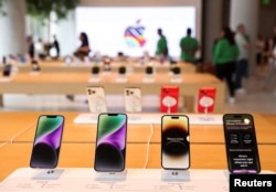 FILE - Apple iPhones are seen inside India's first Apple retail store during a media preview, a day ahead of its launch in Mumbai, India, April 17, 2023. (REUTERS/Francis Mascarenhas)