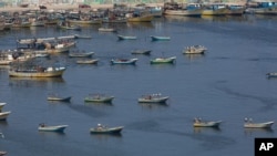 Palestinian fishing boats moored in the Gaza seaport in Gaza City, Thursday, June 13, 2019. The Israeli military took the rare step of closing the Gaza Strip's offshore waters to Palestinian fishermen Wednesday until further notice.