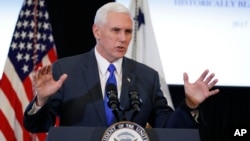 FILE - Vice President Mike Pence participates in a listening session at the Eisenhower Executive Office Building on the White House complex in Washington.