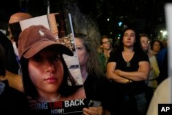 Friends and relatives of the Israeli hostages held in Gaza by Hamas attend a rally calling for their release in Tel Aviv, Israel, on Dec. 9, 2023.