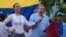 ARCHIVO - María Corina Machado y Edmundo González Urrutia, dirigentes de la oposición venezolana, participan en un mitin de campaña en Guatire, el 31 de mayo de 2024.