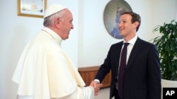 Pope Francis meets Facebook founder and CEO Mark Zuckerberg, at the Santa Marta residence, the guest house in Vatican City where the pope lives, Monday, Aug. 29, 2016. 