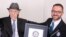 In this photo supplied by Guinness World Records, Marco Frigatti, head of records for Guinness World Records, presents Israel Kristal a certificate for being the oldest living man, in Haifa, Israel, March 11, 2016. 