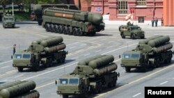 FILE - Russian S-400 surface-to-air missile systems are on displaye during a parade at Red Square in Moscow, Russia, May 9, 2015.