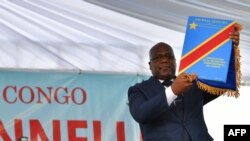 Félix Tshisekedi atomboli Mobeko likonzo na botiyami na ye na bokonzi, na etando ya Ndako ya ekolo, na Kinshasa, le 24 janvier 2019.