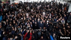 Yasin Aktay, adviser to Turkish president Erdogan, speaks during a symbolic funeral prayer for Saudi journalist Jamal Khashoggi at the courtyard of Fatih mosque in Istanbul, Turkey, Nov. 16, 2018. 