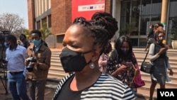 Beatrice Mtetwa, a member of Zimbabwe Lawyers of Human Rights, talks to reporters outside the Harare Magistrates Court in Harare, Zimbabwe, Aug. 18, 2020. (Columbus Mavhunga/VOA)