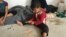 Child displaced by fighting in his village southeast of Mosul in Makhmour, Iraq, April 14, 2016,  (S. Behn / VOA)