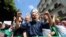 Demonstrators gesture and shout slogans during a protest demanding social and economic reforms, as well as the departure of the country's ruling elite in Algiers, Algeria, Sept. 24, 2019.