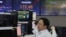 A currency trader watches monitors at the foreign exchange dealing room of the KEB Hana Bank headquarters in Seoul, South Korea, May 20, 2020.
