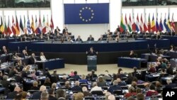 FILE - French President Emmanuel Macron addresses the European Parliament in Strasbourg, France, April 17, 2018.