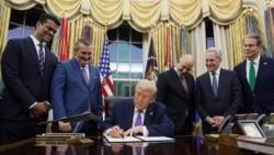 资料照片：特朗普总统在白宫签署一项关于人工智能的行政命令(2025年12月12日)