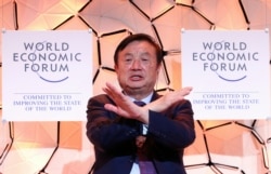 Ren Zhengfei, founder and chief executive officer of Huawei Technologies, gestures during a session at the 50th World Economic Forum (WEF) annual meeting in Davos, Switzerland, Jan. 21, 2020.