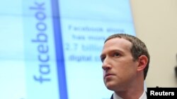 FILE - Facebook Chairman and CEO Mark Zuckerberg testifies at a House Financial Services Committee hearing in Washington.