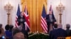 Britain's Prime Minister Keir Starmer, left, and U.S. President Donald Trump speak during a joint press conference in the East Room at the White House, Feb. 27, 2025, in Washington. 