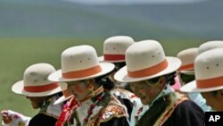 Tibetan women dance in the grasslands of their small village in the district of Naqu, Tibet (file photo)