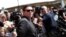 FILE - Unite The Right rally organizer Jason Kessler attempts to speak at a press conference in front of Charlottesville City Hall in Charlottesville, Virginia, Aug. 13, 2017. 