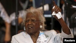 Jeralean Talley, who died Wednesday at age 116 and had been deemed the world's oldest person, addresses the congregation during a church service and her birthday celebration in Inkster, Michigan, May 24, 2015.