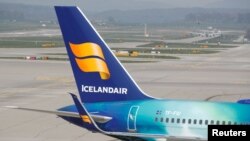 FILE - The logo of Icelandair airlines is seen at the tail fin of a Boeing 757-256 aircraft at Zurich airport, Switzerland, April 16, 2019.