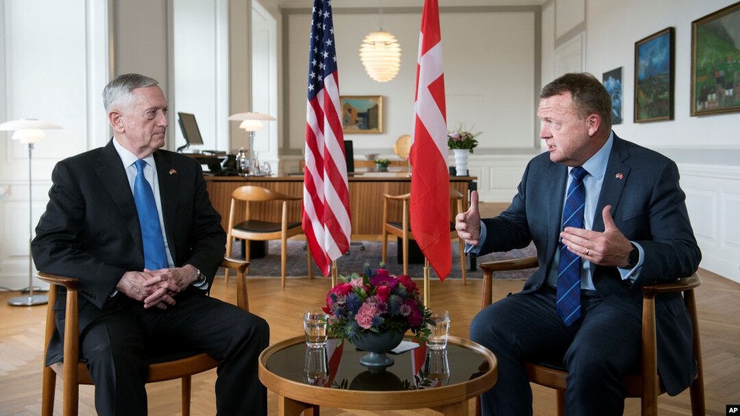 Danish Prime Minister Lars Loekke Rasmussen (R) gestures during a meeting with United States Defense Minister, former General James Mattis (L) in the prime minister's office at Christiansborg Castle in Copenhagen, Denmark, May 9, 2017.
