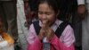 An identified land eviction victim, from Koh Kong province, prays during a rally to submit a petition to the European Union in Cambodia, Thursday, August 04, 2016. (Photo: Leng Len/VOA Khmer)