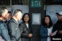 Taiwan President Tsai Ing-wen arrives to cast her vote at a polling station during general elections in New Taipei City, Taipei, Taiwan, Jan. 11, 2020.