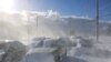 FILE: A view of vehicles covered in snow on a road, following a winter storm that struck the region, in Buffalo, New York, U.S December 25, 2022