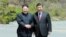 North Korean leader Kim Jong Un shakes hands with China's President Xi Jinping, in Dalian, China in this undated photo released on May 9, 2018 by North Korea's Korean Central News Agency (KCNA).