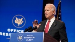 President-elect Joe Biden, accompanied by Vice President-elect Kamala Harris, speaks at The Queen theater, Nov. 19, 2020, in Wilmington, Del.